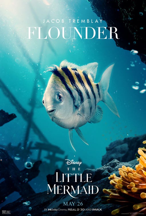 A poster featuring Flounder, now blue and grey and skinny. His eyes are unsettling. It makes you depressed just to see him. He looks like he's going through a messy divorce. He looks like it’s Christmas and he has to tell the orphans they’re getting kicked out onto the street but also like he is somehow one of the orphans himself. 