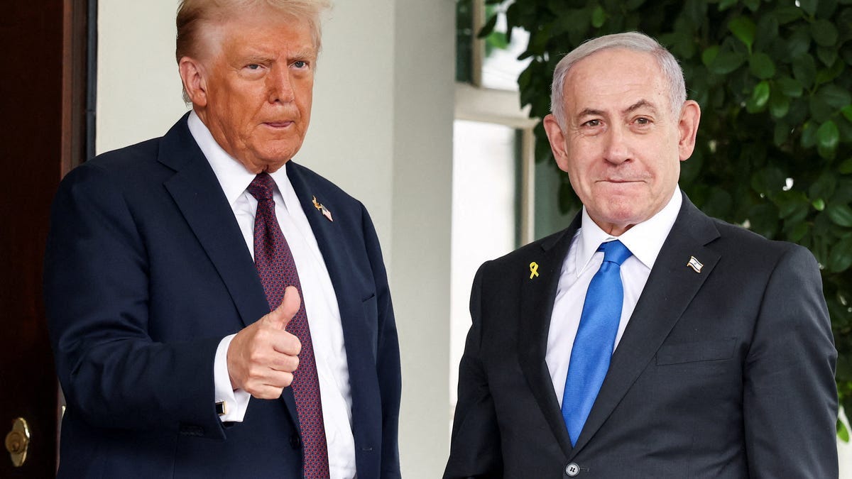 President Donald Trump gives a thumbs up as he welcomes Israeli Prime Minister Benjamin Netanyahu at the White House in Washington, D.C., U.S., September 29, 2025.