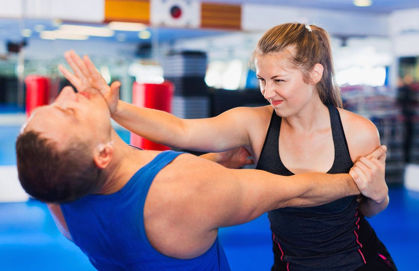 Woman Striking Man