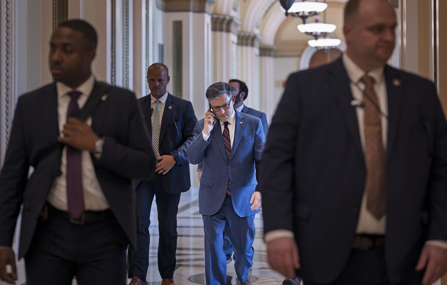 Speaker of the House Mike Johnson leaves the chamber at the Capitol in Washington, Thursday. 