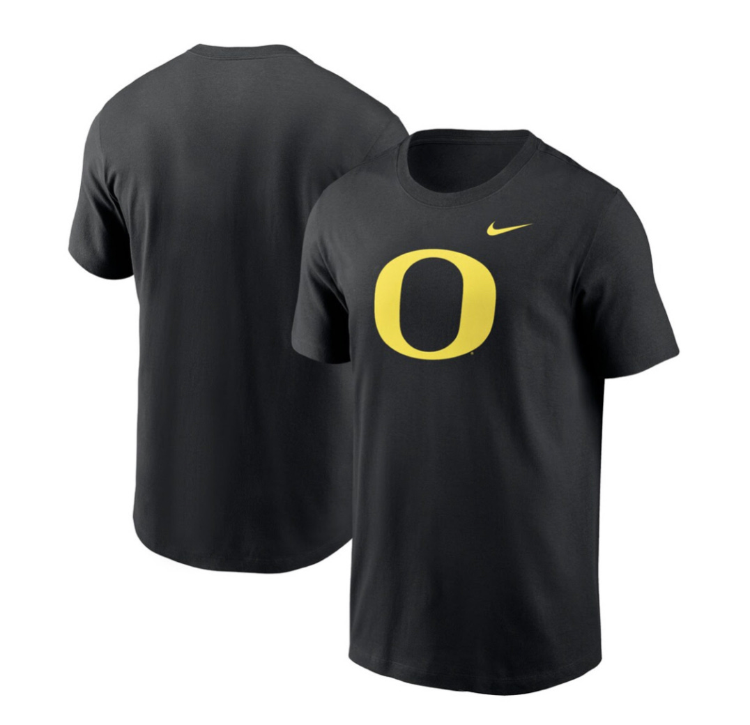 Official Nike Oregon Ducks blackout t-shirt featuring bold yellow “O” logo on black fabric; the must-have game day shirt for the Oregon vs. Oregon State rivalry blackout, perfect for fans to wear black at Autzen and show team pride.