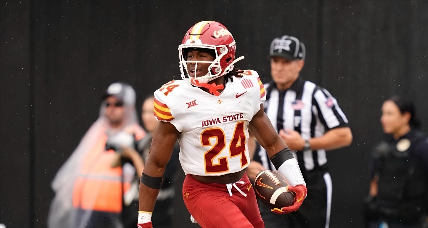 Iowa State running back Abu Sama celebrates after scoring a touchdown.