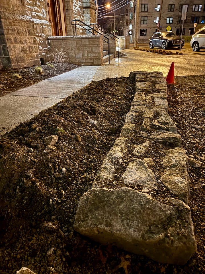 Two shorter recycled stone walls completed by James, the second in the dark with the street light! 