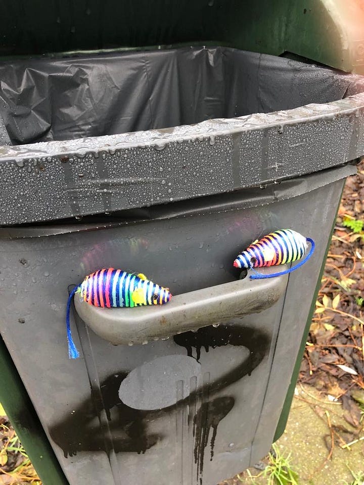 Pictures of decorated garbage bins
