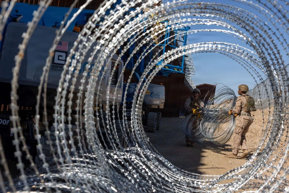 US Marines assigned to the Joint Task Force-Southern Border install concertina wire to deter illegal crossings into the US from Mexico US Marines assigned to the Joint Task Force-Southern Border install concertina wire to deter illegal crossings into the US from Mexico