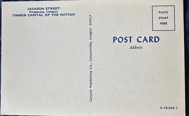 Front and back of a postcard depicting Downtown Roseburg Oregon