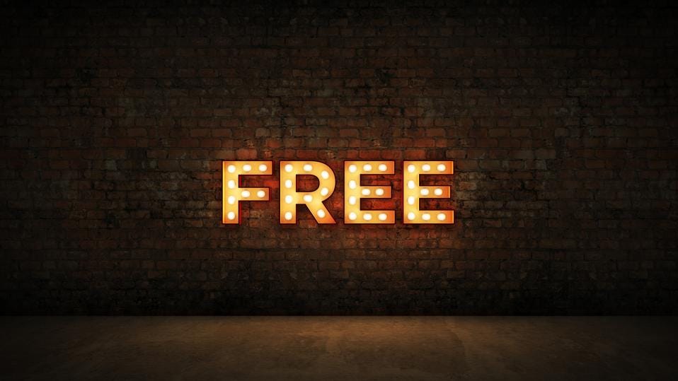 Neon Sign on Brick Wall background - Free. 3d rendering