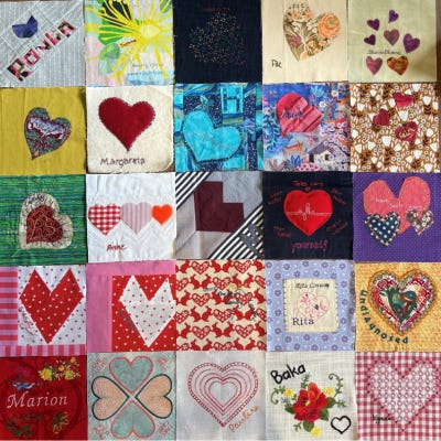 A patchwork quilt with blocks full of hearts.