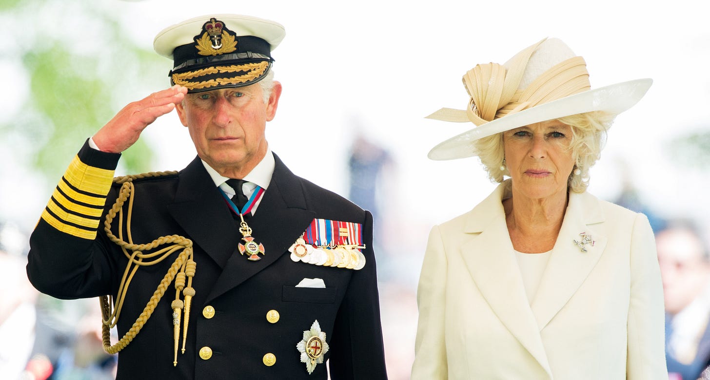 Charles saluting with Camilla at D-Day 70th anniversary