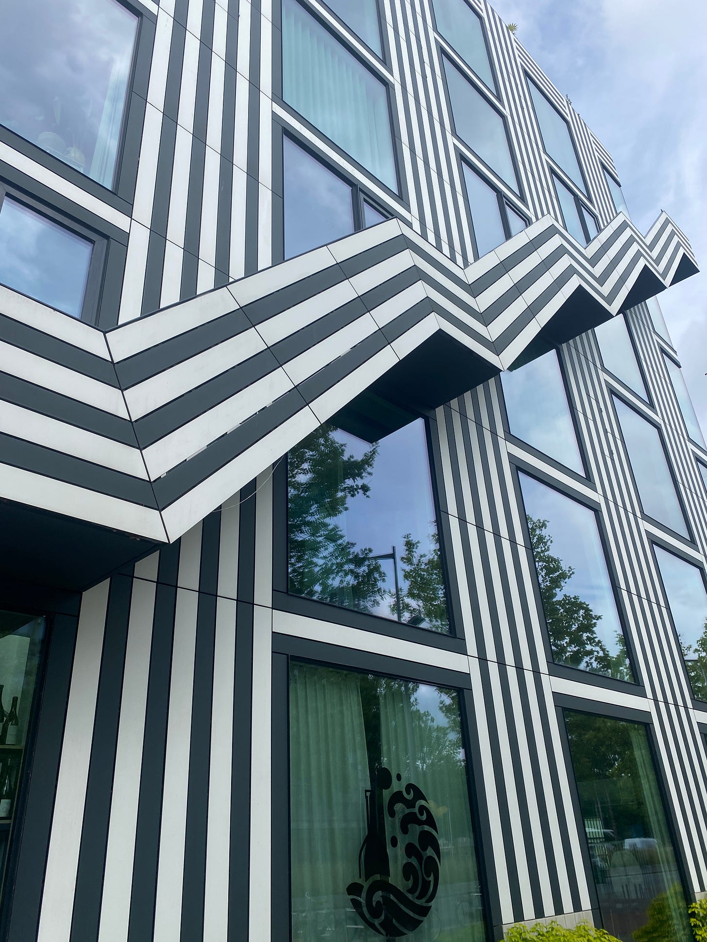 black and white striped building with external angles staircase