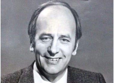 A person smiling for the camera

Description automatically generated