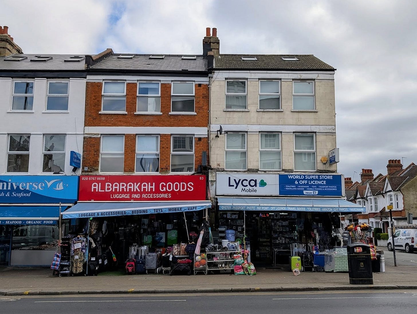 May be an image of 1 person, street and text