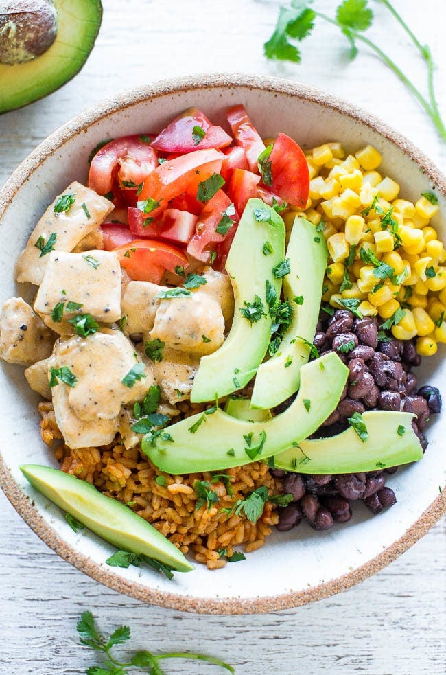 Buffalo Chicken Burrito Bowls - Juicy chicken along with your favorite burrito ingredients served in a bowl!! Pile the toppings sky high and not worry about a wrap breaking, plus it's a little healthier!! Easy and ready in 15 minutes!! Buffalo Chicken Burrito Bowls - Juicy chicken along with your favorite burrito ingredients served in a bowl!! Pile the toppings sky high and not worry about a wrap breaking, plus it's a little healthier!! Easy and ready in 15 minutes!!