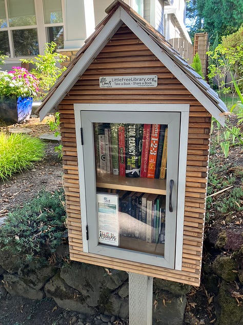 Photos of libraries, author holding a book, mini-book library