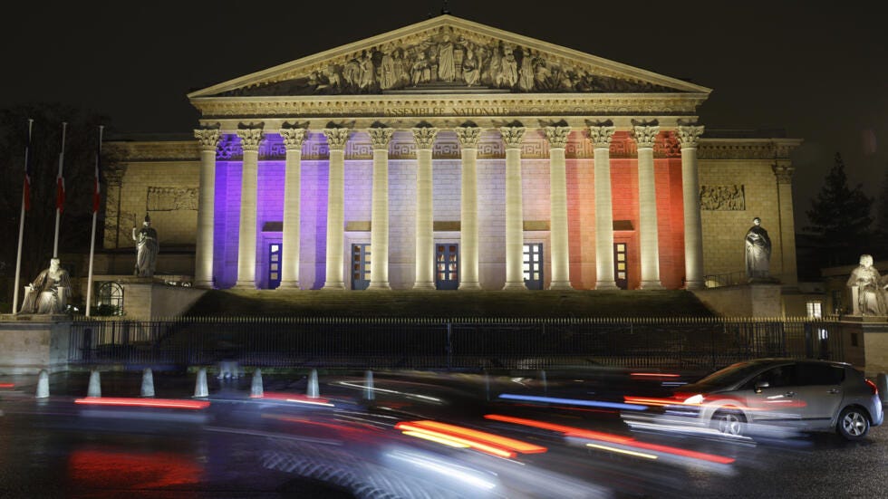 A view of the facade of the French National Assembly building, the Palais Bourbon in Paris. A view of the facade of the French National Assembly building, the Palais Bourbon in Paris.