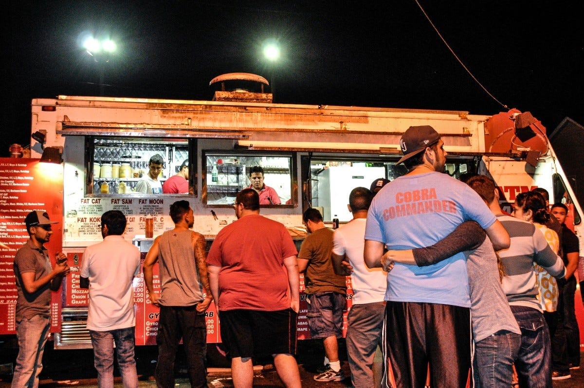 Patrons say farewell to the trucks on their final night in Lot 8. Photo by Chase Brush Patrons say farewell to the trucks on their final night in Lot 8. Photo by Chase Brush