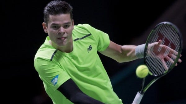 miloa raonic battles bulge hard for stan wawrinka rotterdam tennis 2015 miloa raonic battles bulge hard for stan wawrinka rotterdam tennis 2015