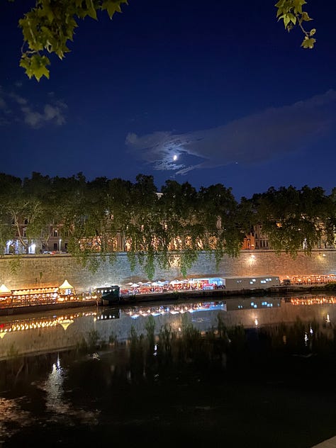 Rome of an evening: the Arco di Giano at twilight, and the lungotevere and Colosseum once night has fallen.