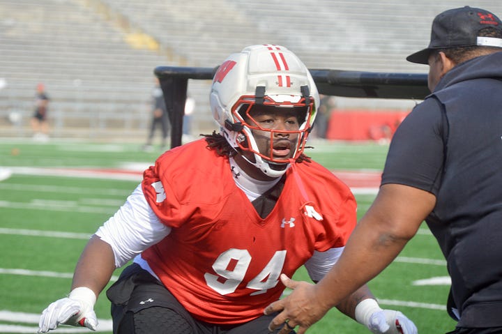 Wisconsin defensive linemen participate in individual position drills during Saturday's spring practice inside Camp Randall Stadium.