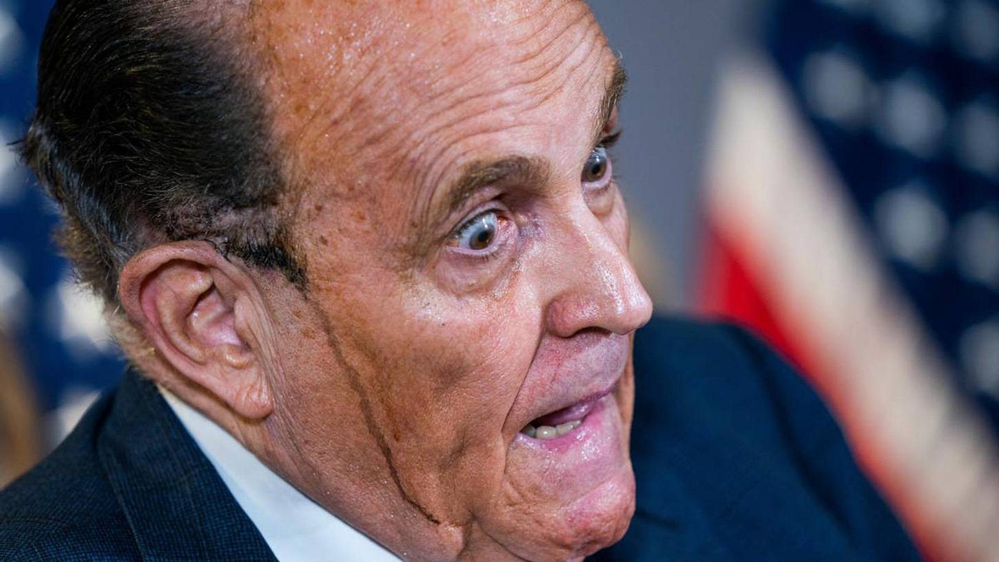 Giuliani hits headlines with running hair dye as he defends Trump – The  Irish Times