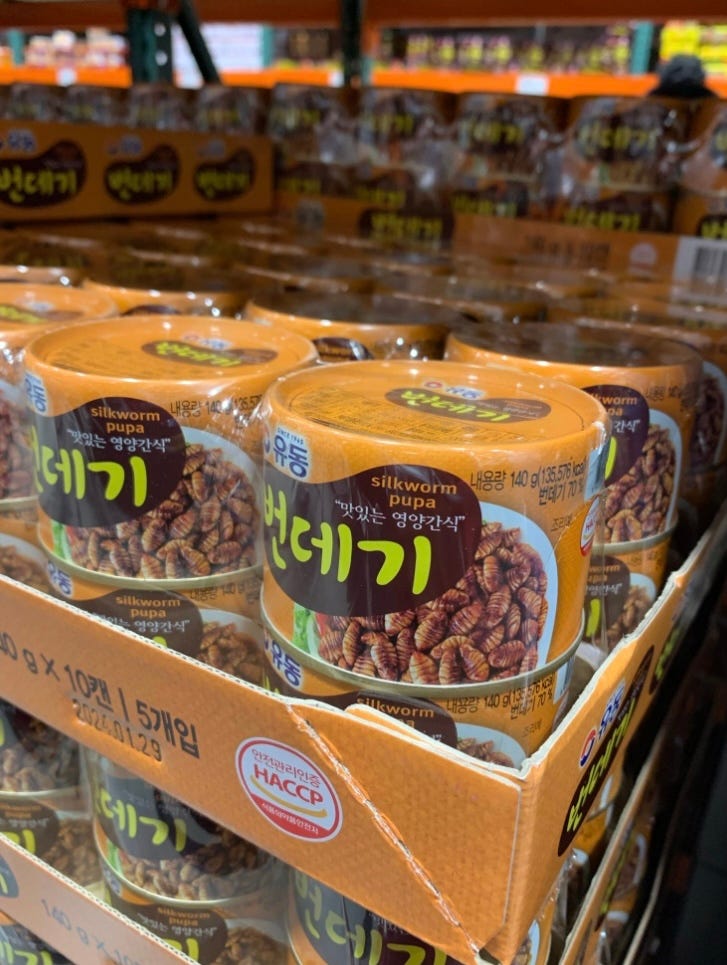 Cans of silkworm pupa