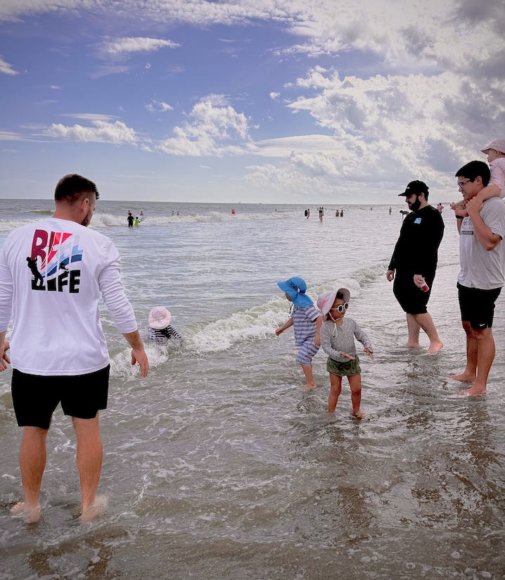 Author and relatives on the beach with their kids