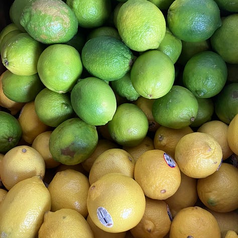 Green beans, tomotoes, carrots, oranges, lemons, limes, apples