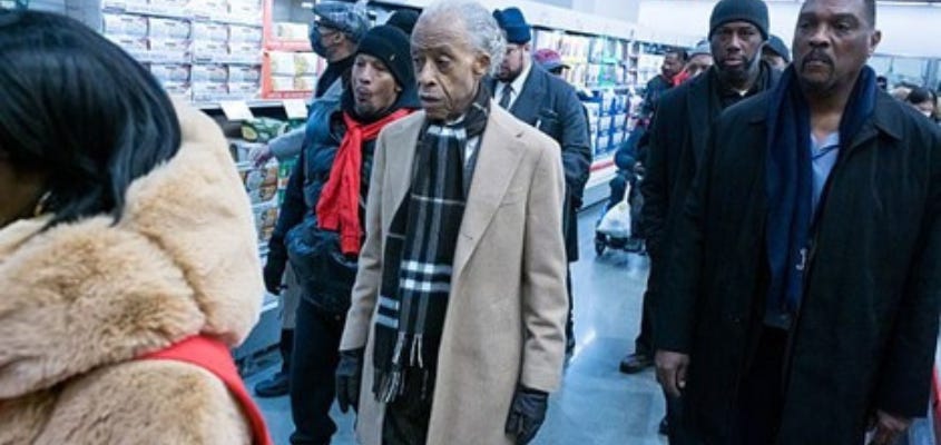 Al Sharpton and others walking through Costco