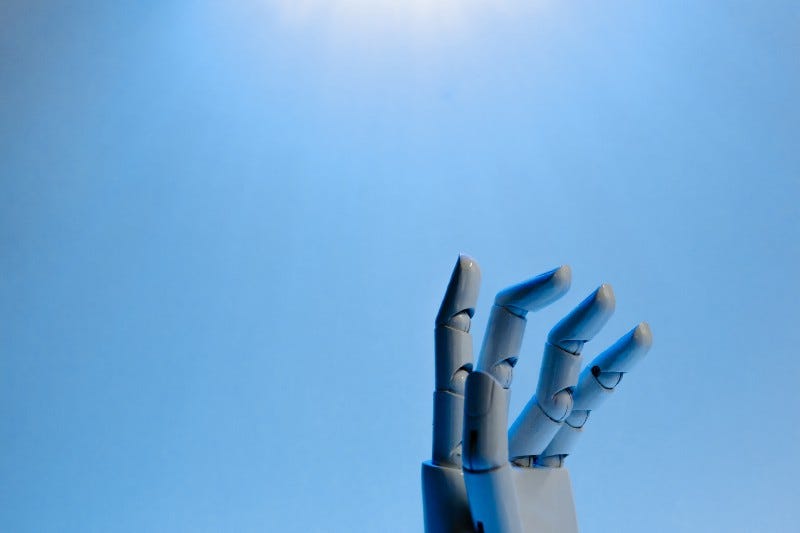 The fingers of a robot reach for the sky The fingers of a robot reach for the sky