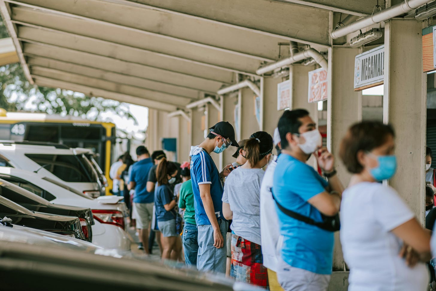 Line of Waiting People · Free Stock Photo