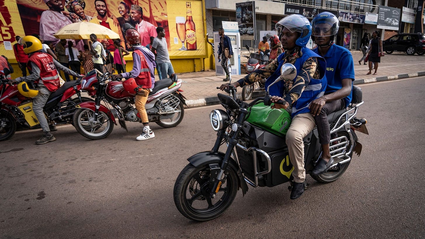 A Spiro electric bike being driven on the streets. A Spiro electric bike being driven on the streets.
