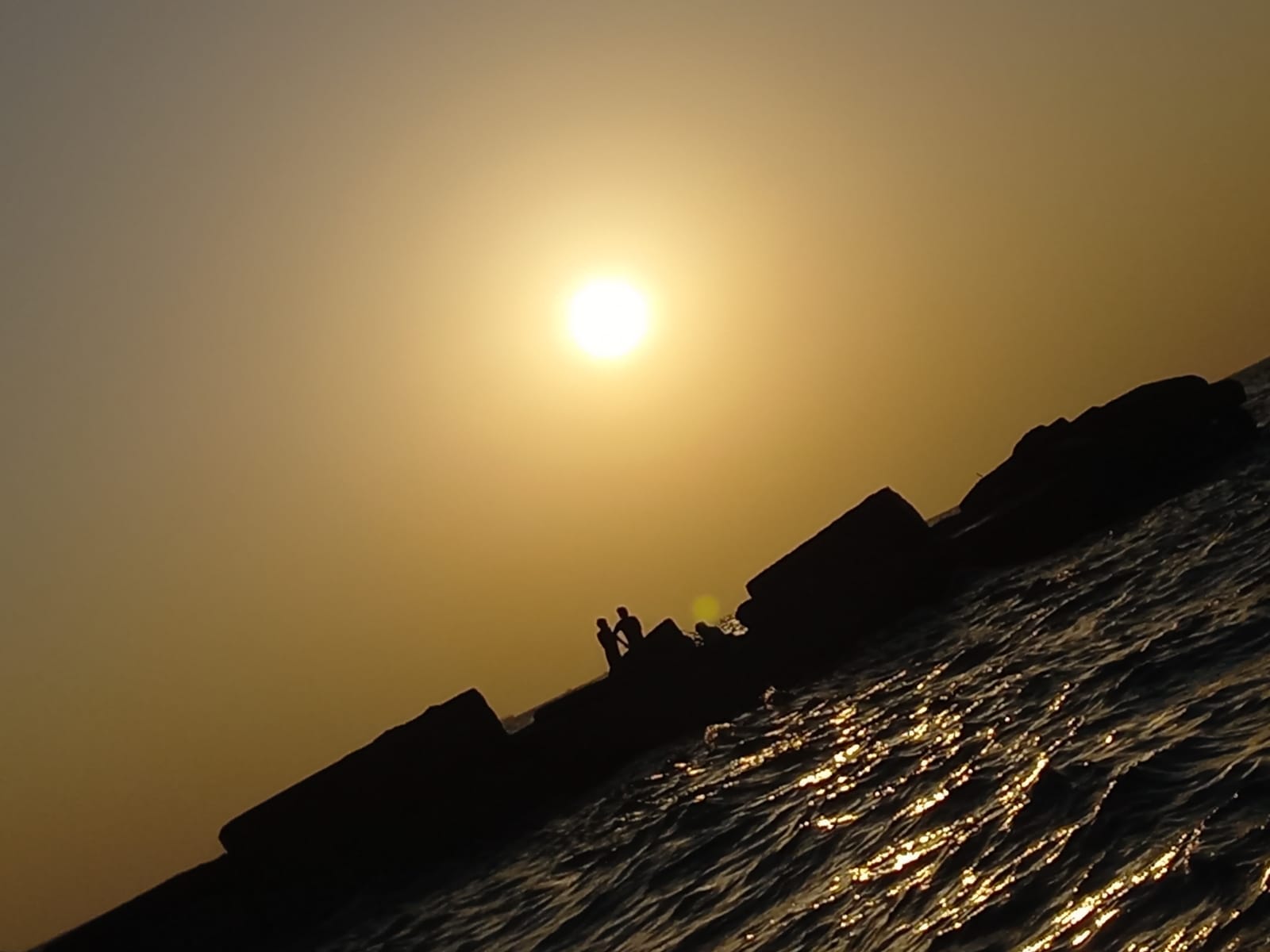 Sun setting in Gaza, in a sky not filled with drone. April 2024. 