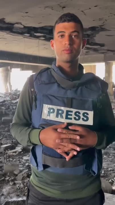 Journalist Hossam Shabat reporting from the scene of an Israeli massacre… |  Asif Kola عاصف كولا