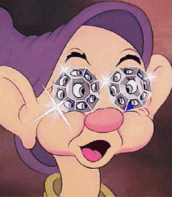 a close up of a cartoon character 's face with diamonds in his eyes a close up of a cartoon character 's face with diamonds in his eyes