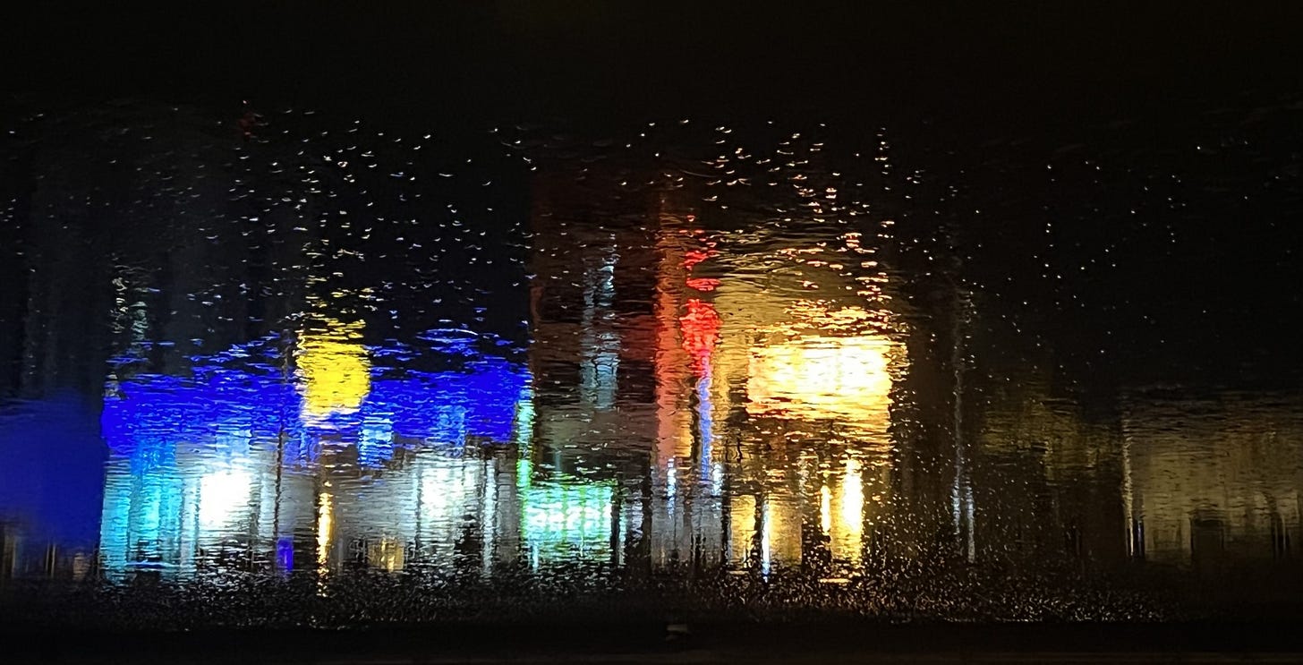 A reflection in the river at night