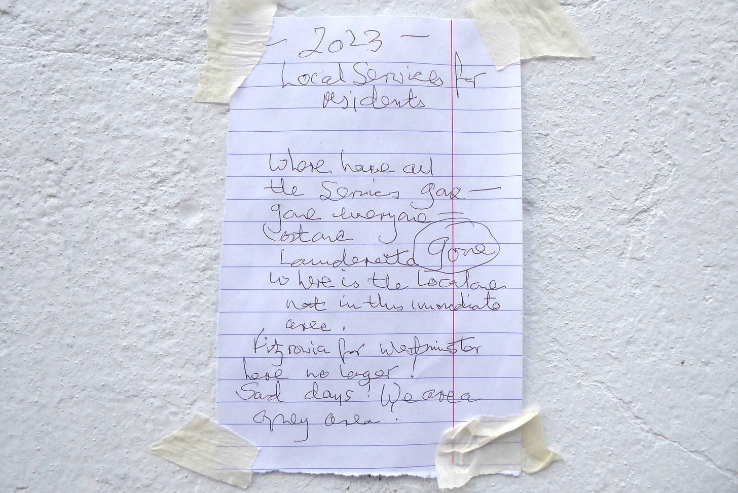 Handwriten note taped to a wall asks where have all the local services gone.
