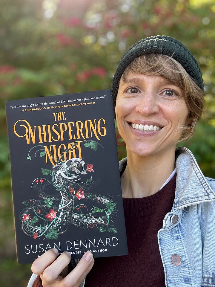 Images of the US edition of The Whispering Night, one showing Susan holding it and smiling. A mother showing it lying on a wooden background. Another showing the hardcover stamp of the Luminaries moon in copper. And a final image of the Whispering Night with beach grass and a green wall behind it.