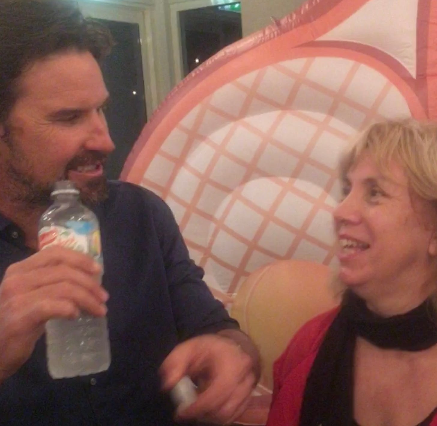 Tennis player Patick Rafter joking with the author of this story at a fundraising event