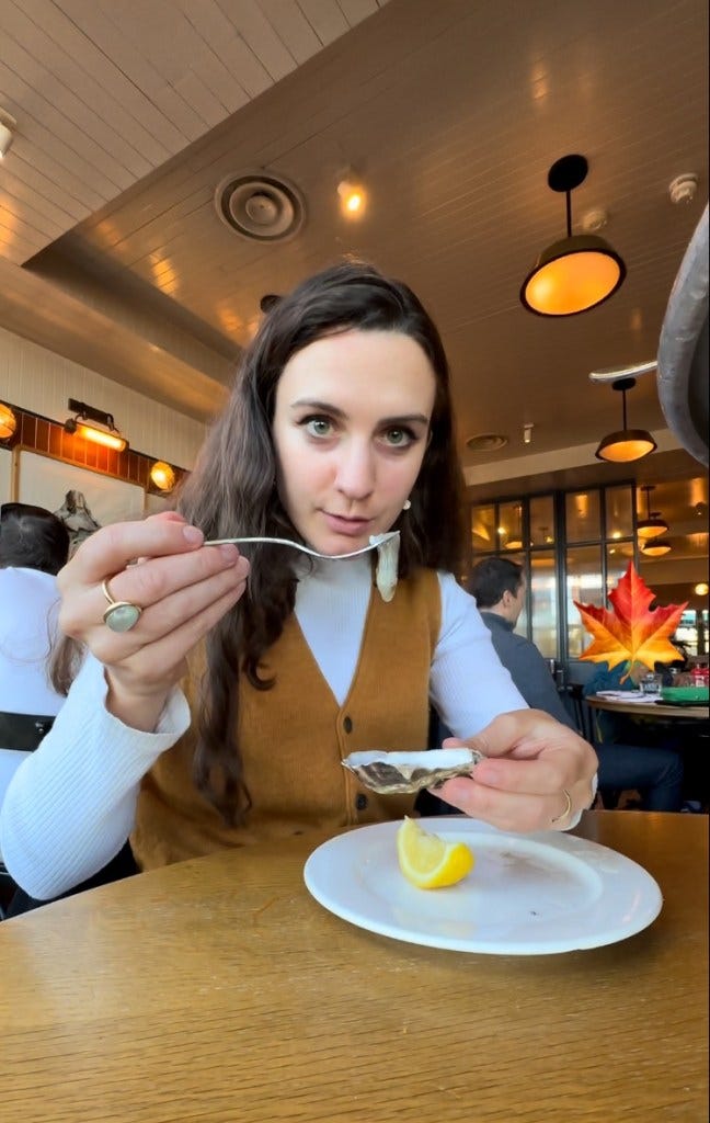 Georgiana eats an oyster. Georgiana eats an oyster.