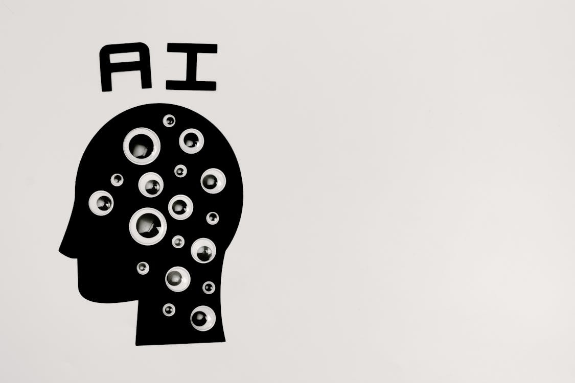 Free Abstract illustration of AI with silhouette head full of eyes, symbolizing observation and technology. Stock Photo Free Abstract illustration of AI with silhouette head full of eyes, symbolizing observation and technology. Stock Photo