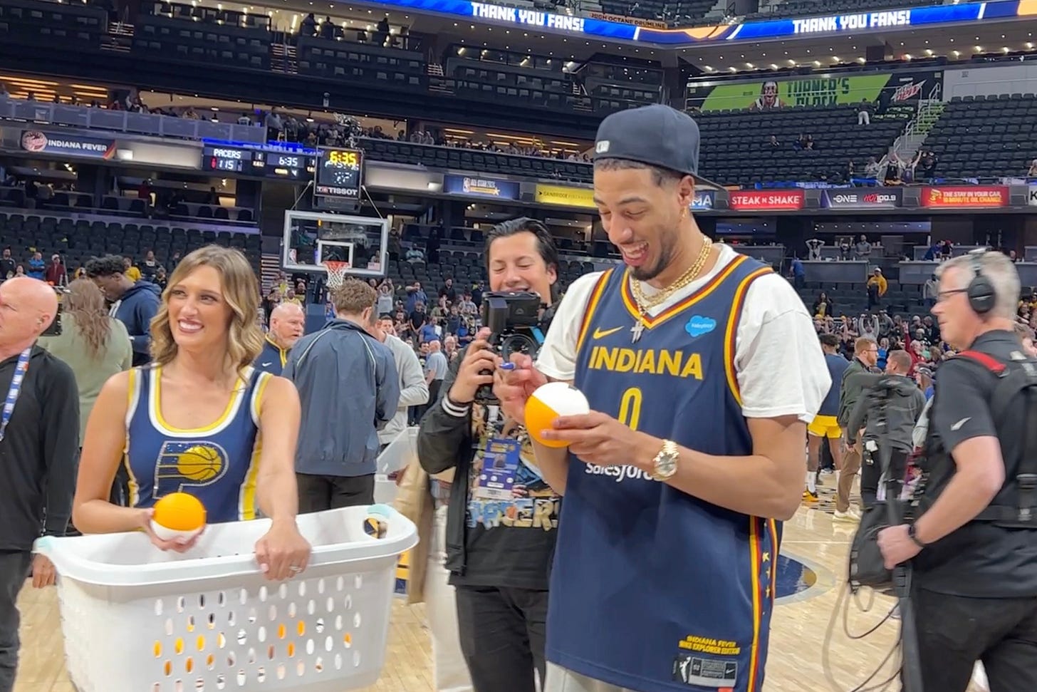 Tyrese Haliburton signs autographs on Fan Appreciation Night after his first full season with the Indiana Pacers. Tyrese Haliburton signs autographs on Fan Appreciation Night after his first full season with the Indiana Pacers.