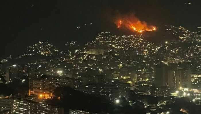 Caught on camera: Fireballs erupt across Caracas in suspected US strike;  residents flee to the streets