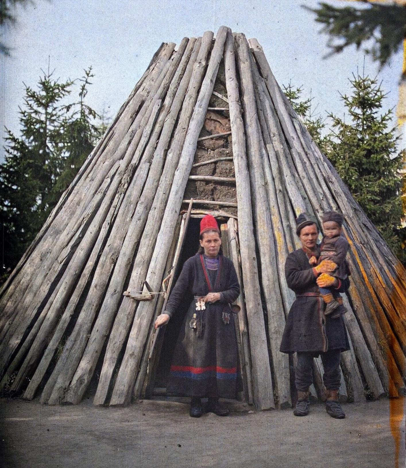 Swedish Sámi Family in front of their traditional dwelling in Skansen. 29th August 1910