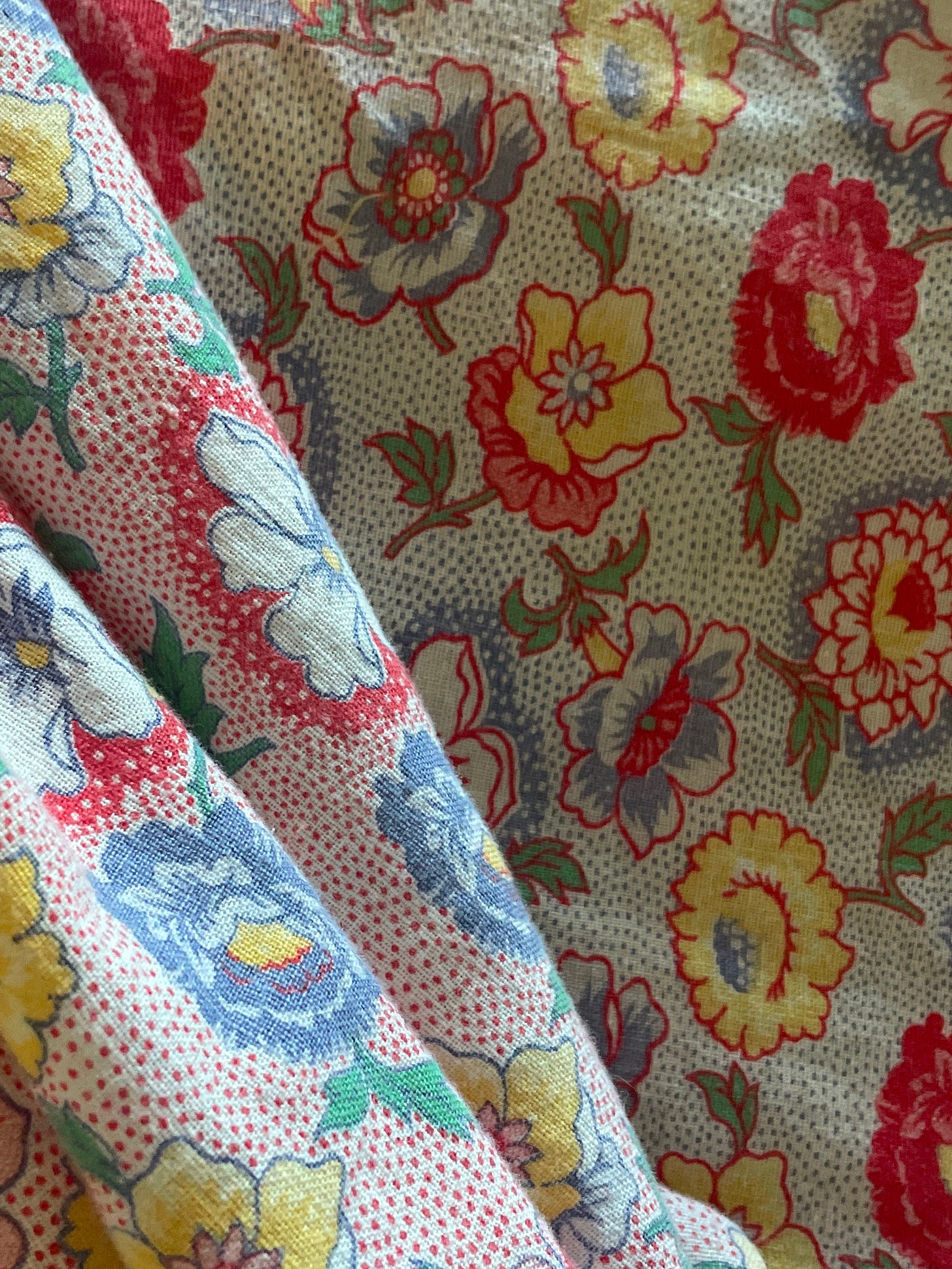 Red and blue version of a poppy print on a flour sack