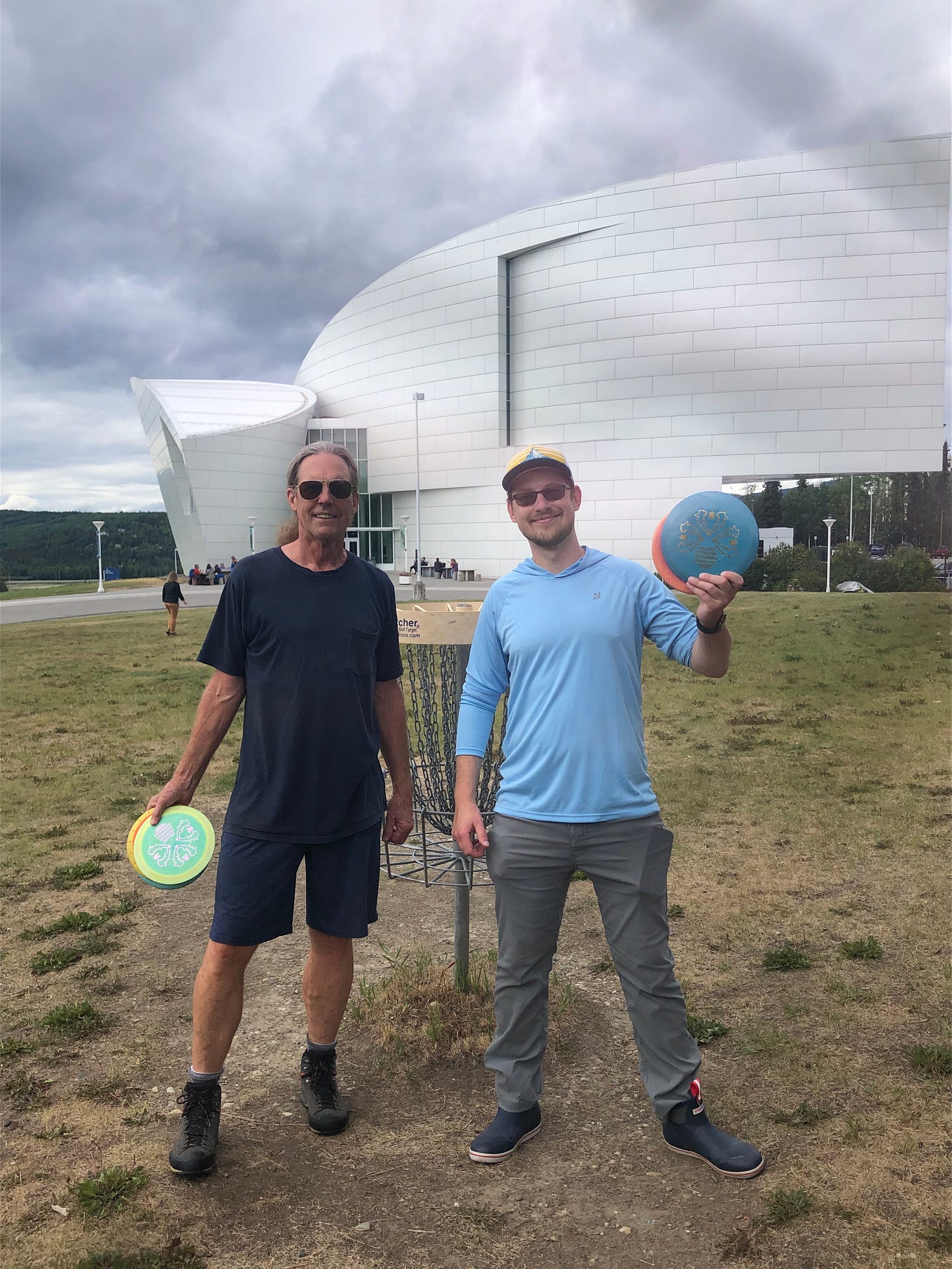 John and I playing disc golf