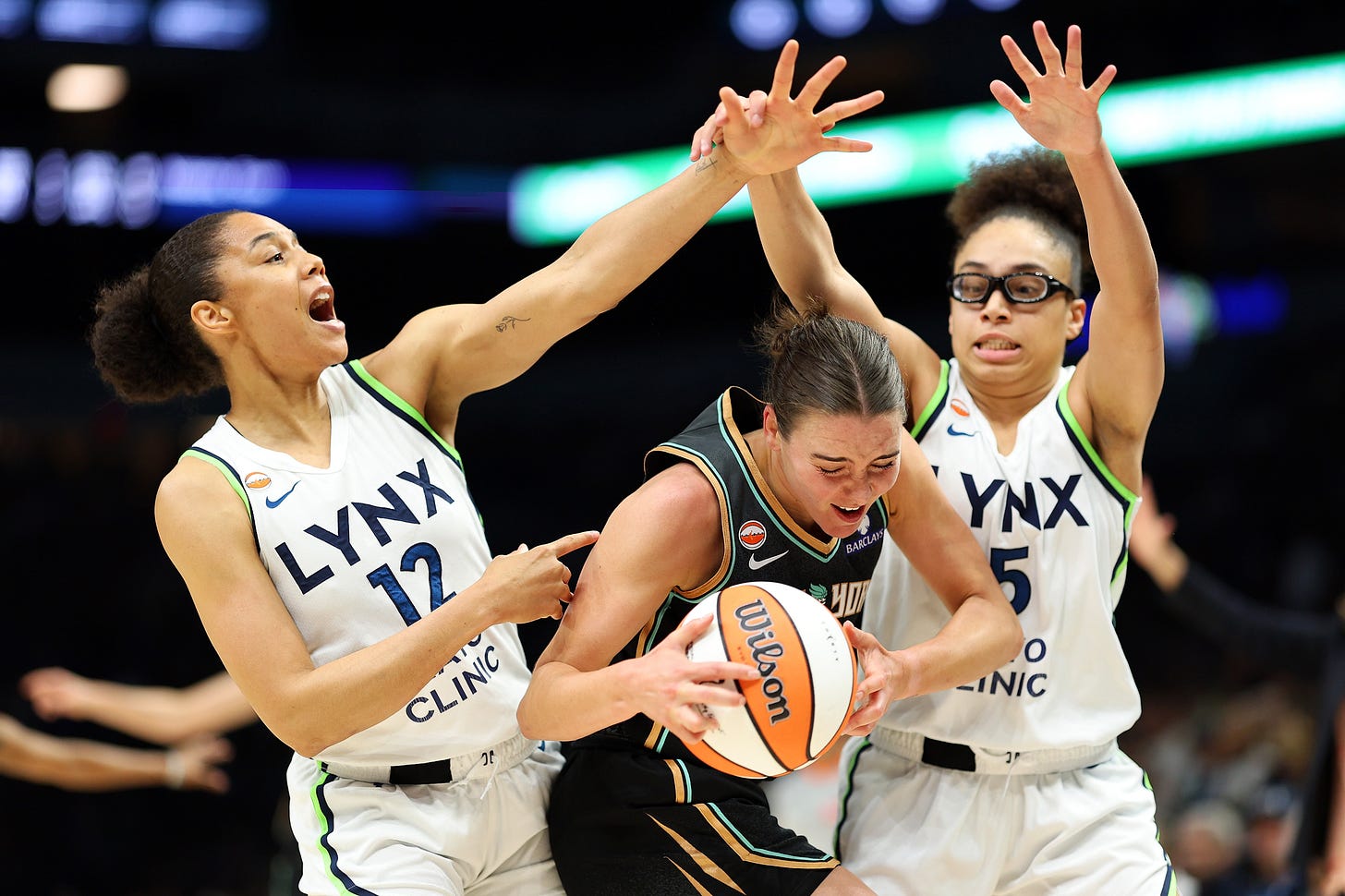 New York Liberty v Minnesota Lynx Pauline Astier #18 of the New York Liberty handles the ball against Nia Coffey #12 and Olivia Miles #5 of the Minnesota Lynx in the first quarter at Target Center on July 11, 2026 in Minneapolis, Minnesota. (Photo by David Berding/Getty Images)