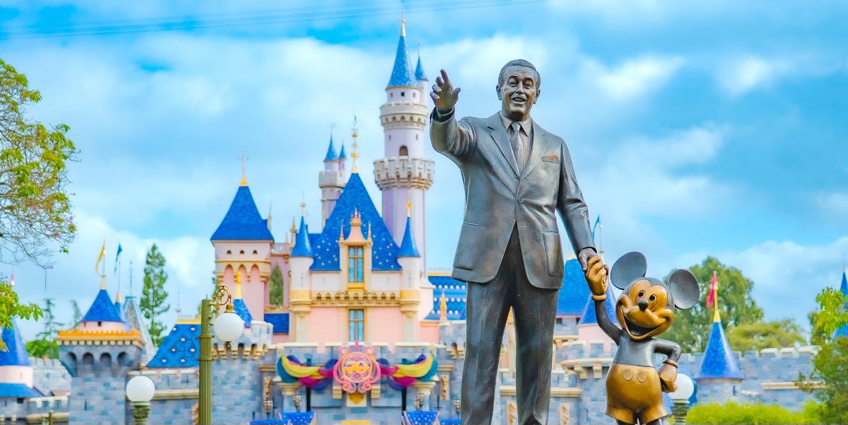 Walt Disney and Mickey Mouse at Disneyland.