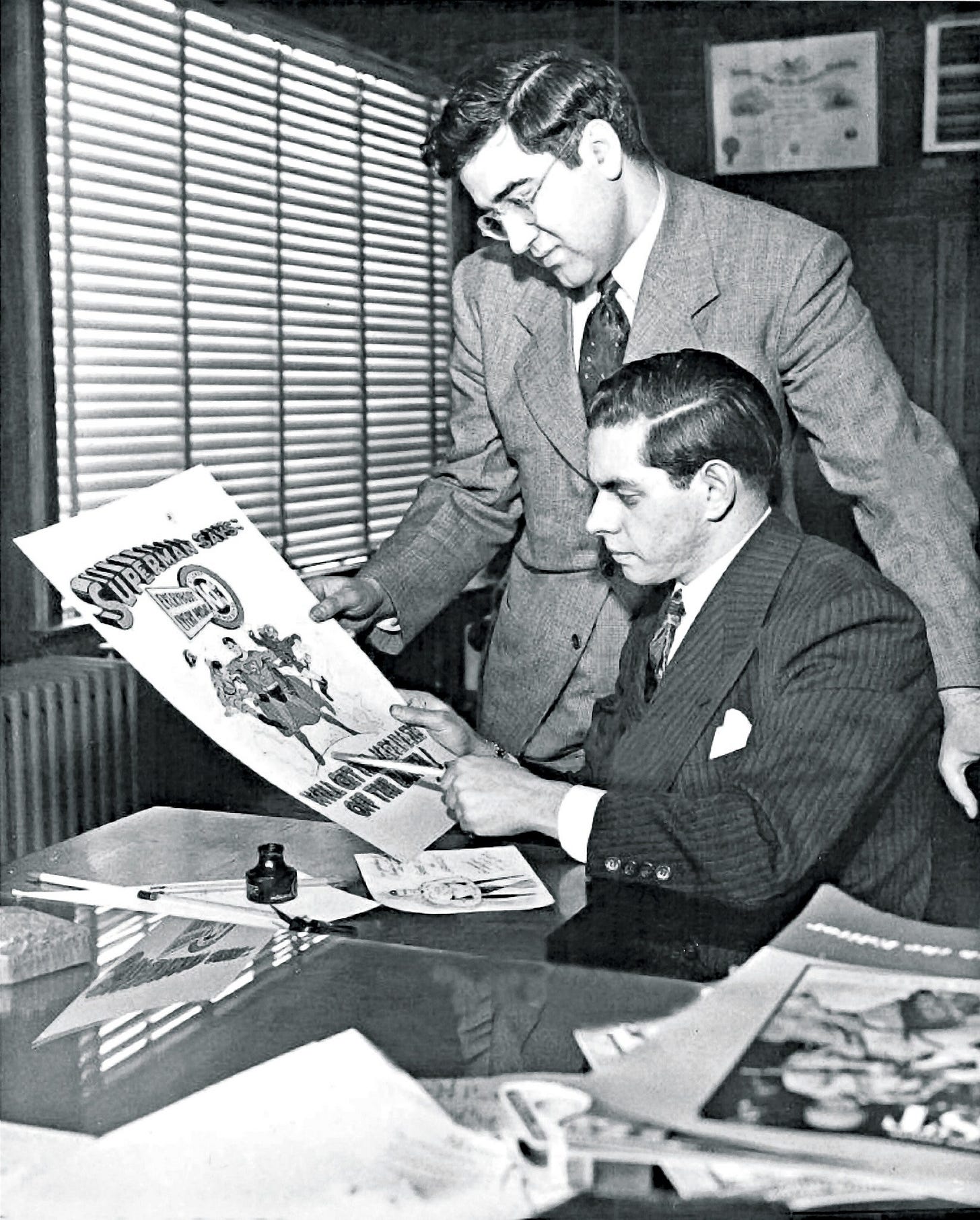 Joe Shuster and Jerry Siegel at work on Superman in their studio in 1942. Joe Shuster and Jerry Siegel at work on Superman in their studio in 1942.