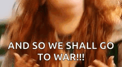 a close up of a woman 's face with the words `` and so we shall go to war '' written on it .