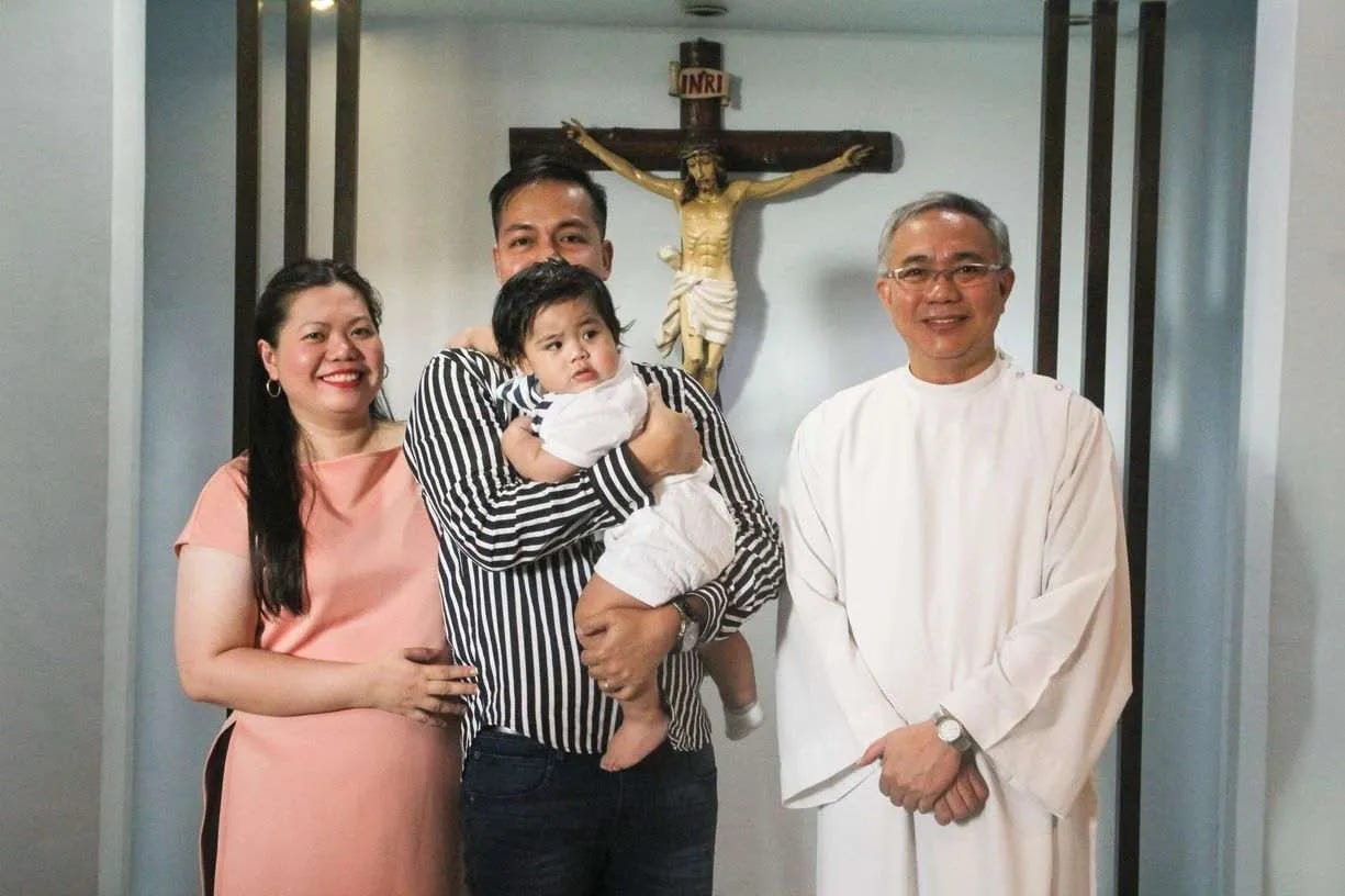 Family photo after Miguel's baptism Family photo after Miguel's baptism